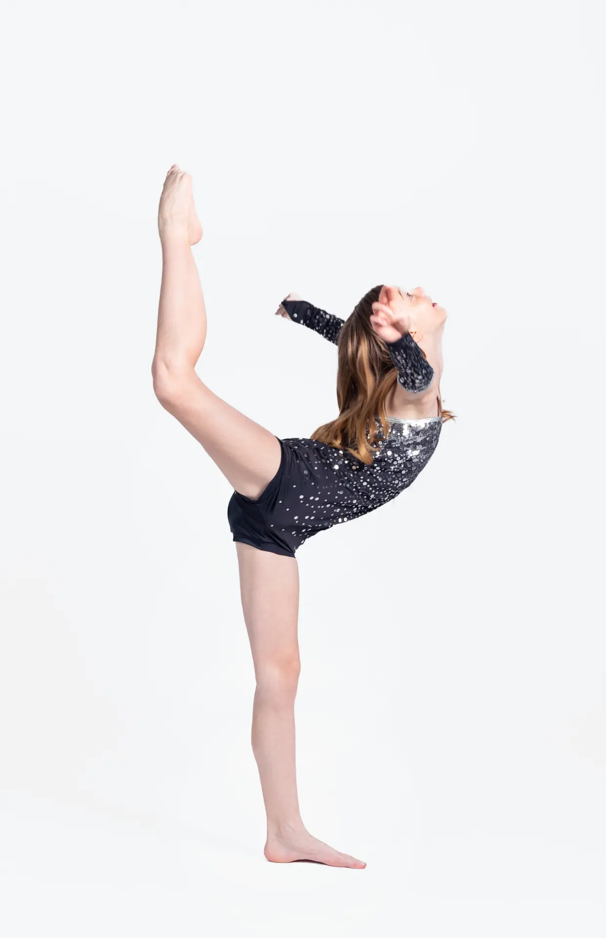 Acro dancer in a backbend pose