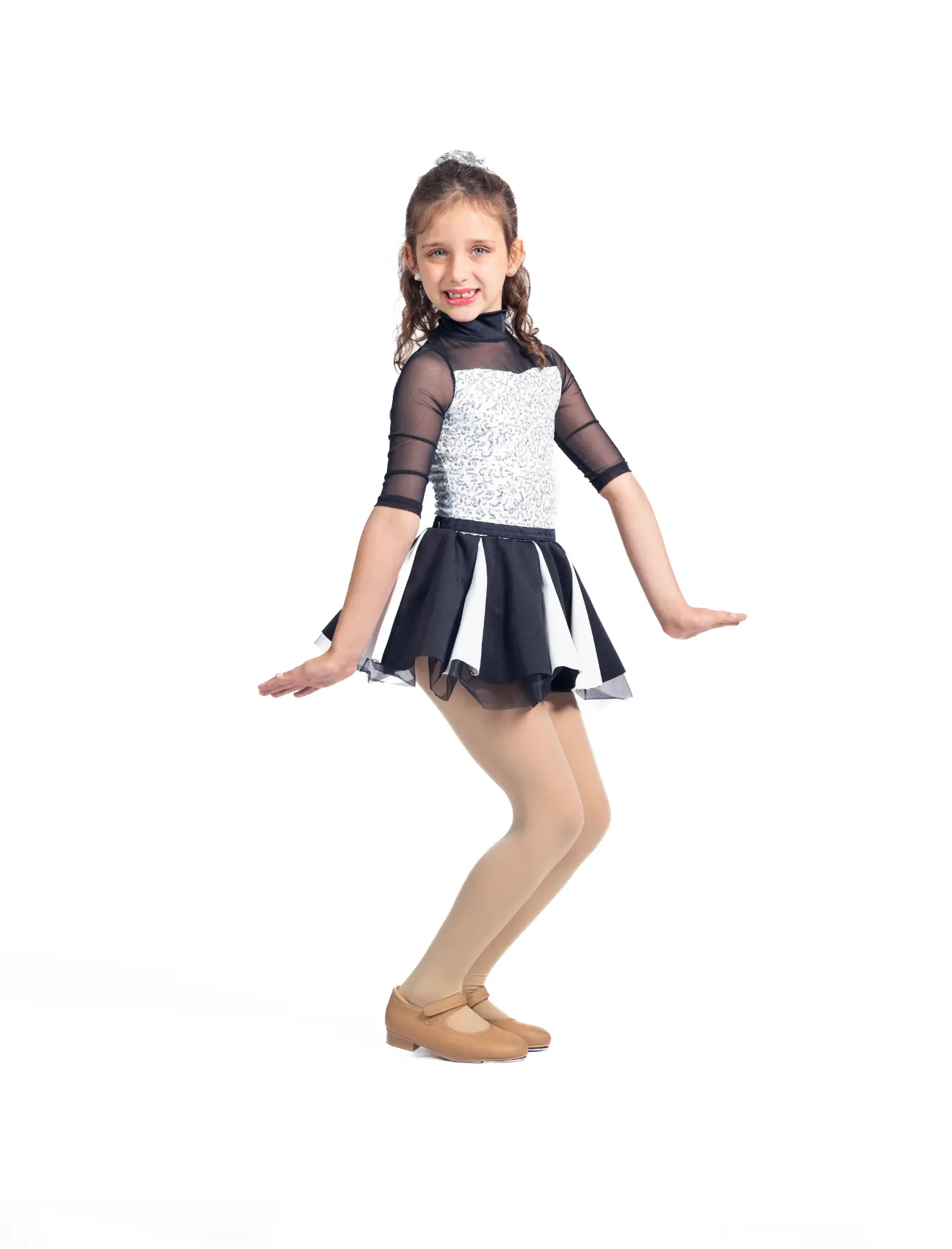 Tap dancer in a black and white costume